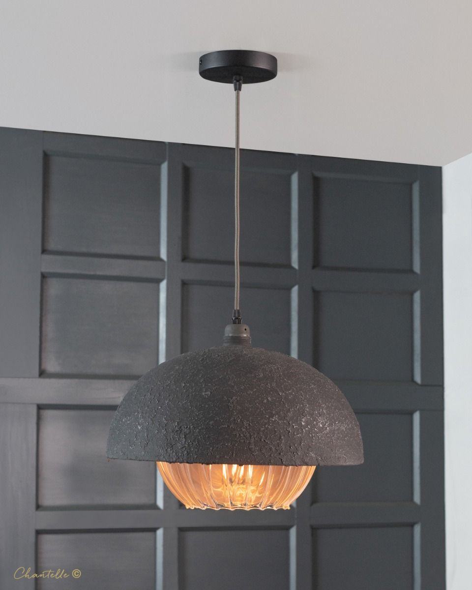 textured grey pendant with pumpkin globe