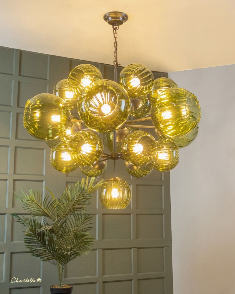 antique brass chandelier with pistachio pumpkin glass globes