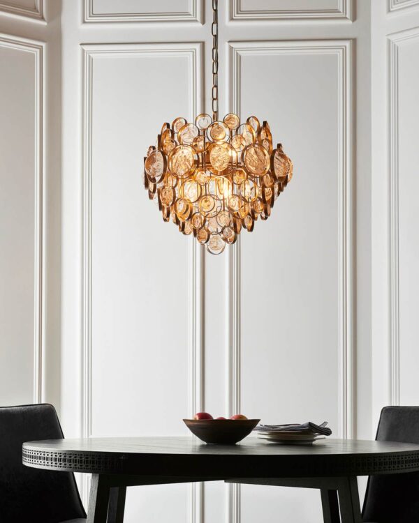 Antique gold chandelier with clear and amber glass detail