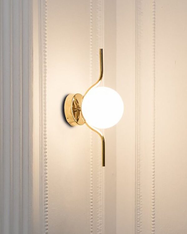 Brass gold wall light with opal globe