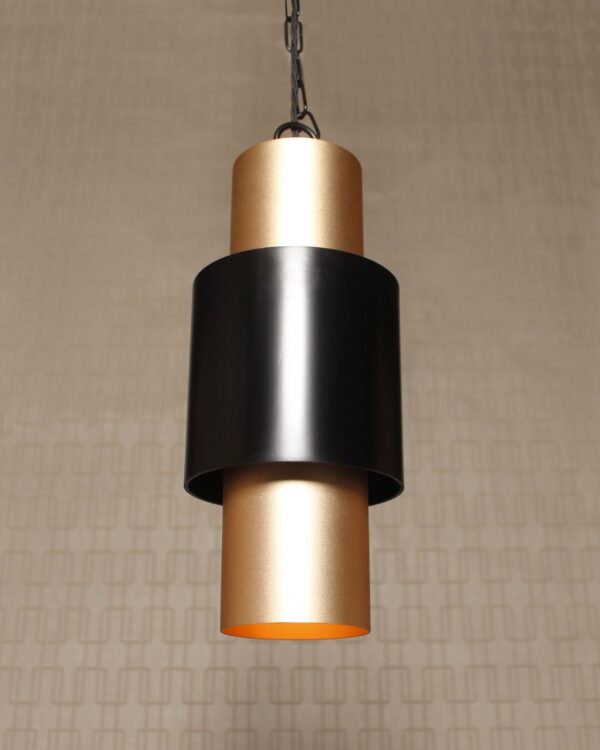 Retro pendant light with a gold spray inner tube and a satin black outer tube with black twisted flex and chain.