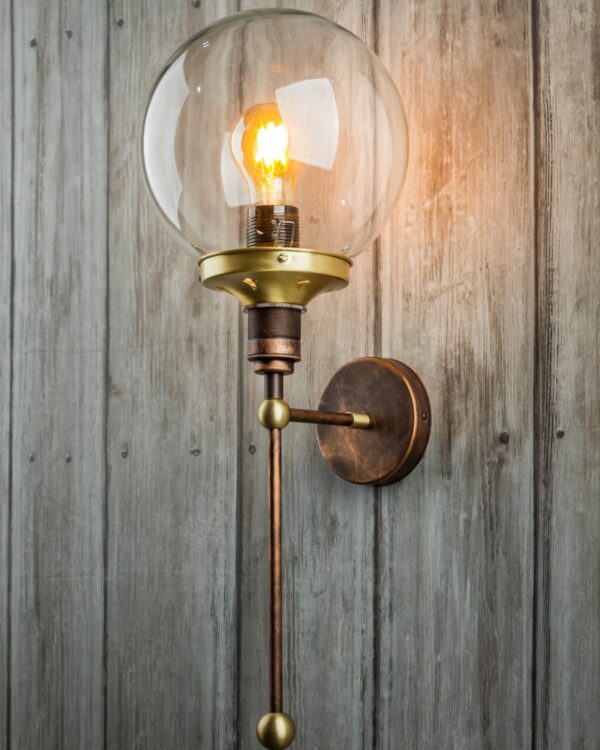 Retro brass and bronze wall light with glass globe
