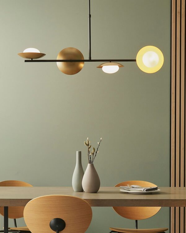 Gold & bronze dish linear pendant with pebble-shaped glass